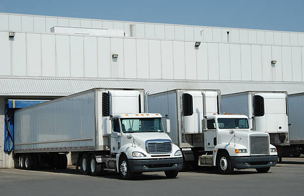 Semi truck parked at shipping loading dock
